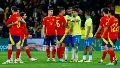 Amistosos: Brasil y España empataron con polémicas, perdió Uruguay y Francia pudo con Chile