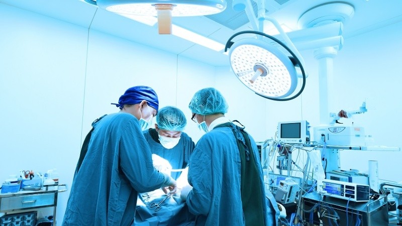 group of veterinarian surgery in operation room