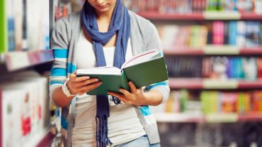 Reading book in library