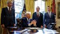 US President Trump signs executive order in the Oval Office at the White House